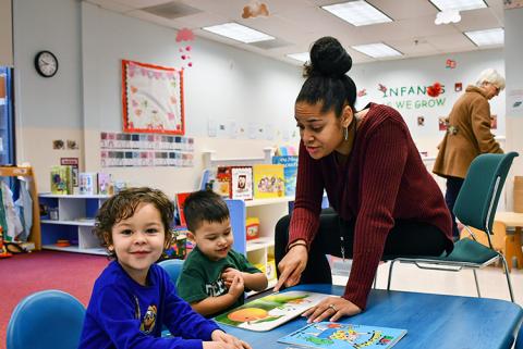 Family Support 2023 Two boys learning in a Family Support Center.