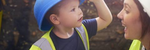 Boy in a hard hat.