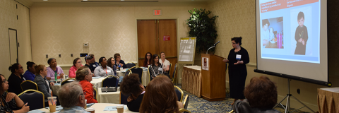 Family Support Network staff gather in a workshop