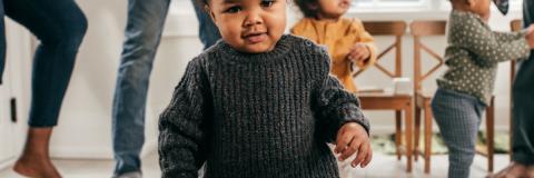 Black Child National Agenda Toddler looking at the camera.