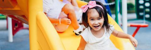 Anxiety in Young Children Preschool children on a yellow slide