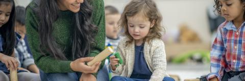 Here's Something We Can All Agree On Pre-K teacher and female student