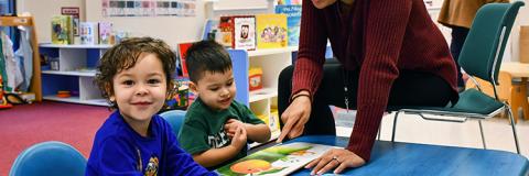 Family Support 2023 Two boys learning in a Family Support Center.