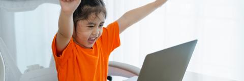 IT RFP Little girl working at a computer.