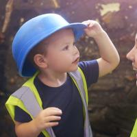 Boy in a hard hat.