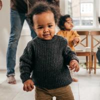 Toddler looking at the camera.