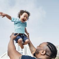 Dad and son playing. 