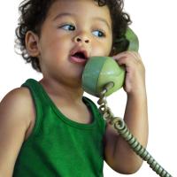 Little boy on the landline.