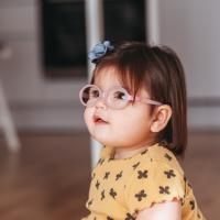 Little girl with glasses. 