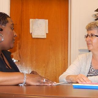 Coaching and Mentoring Child care provider consults with her mentor