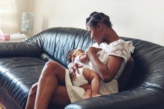Sometimes it Hurts to be a Baby Mother cuddling with baby.