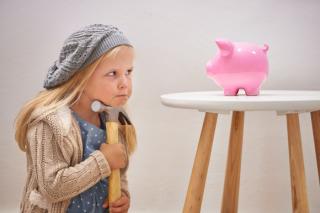 Sweet Relief Girl ready to break piggy bank