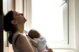 Being a parent is hard. Tired mom and tired baby.
