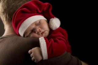 Laughing in the face of holiday stress. Sleeping Santa Baby