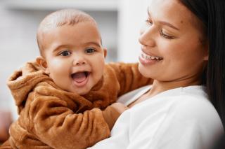 Their Better Angels Happy Latino baby and mom.