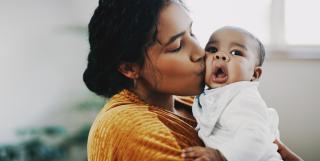 Child Care Scholarship I Child care provider and little boy.