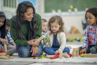 Here's Something We Can All Agree On Pre-K teacher and female student