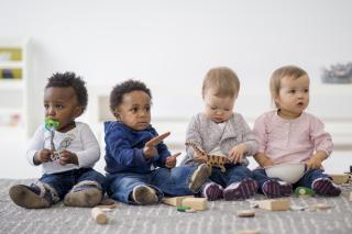 Child Poverty 2022 Four babies.