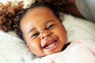 Month of the Young Child #2 Smiling baby girl.