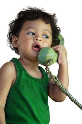 Little boy on the landline.