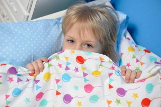 Nightmares aren't all bad. Little girl wakes up after a bad dream.