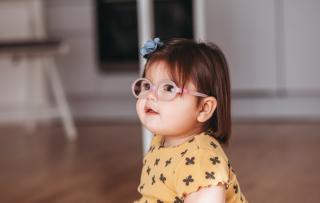 Little girl with glasses. 
