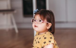 Vision Screening Little girl with glasses.