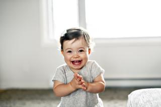 Happy toddler clapping!