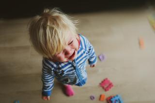 Crying blonde haired toddler. Verbal Abuse