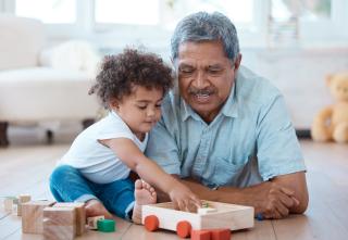 Grandparents Can Reduce Stress Grandfather and grandson playing.