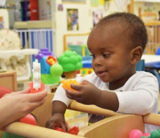 Building Blocks to Success - child playing with blocks