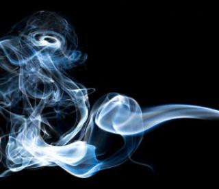 Smoke rings on black background 