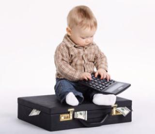 Baby bookkeeper with suitcase of money