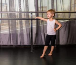 Little boy dancer in a dance studio