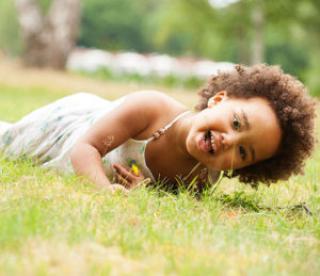 Young African-American girl is having fun outside 