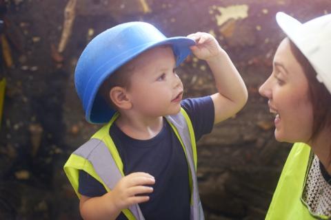 Boy in a hard hat.