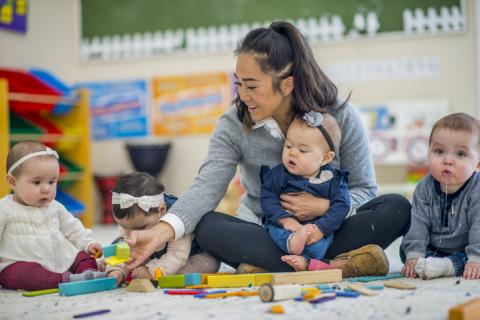 Teacher and Child Playing with Blocks Teacher and Child Playing with Blocks