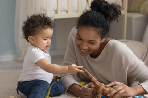 GOFCC 4 A female in home child care provider with little boy.